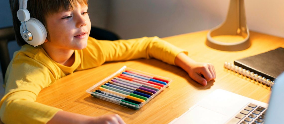 high-view-child-taking-virtual-courses